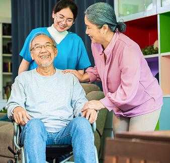 Caregiver supporting an elderly client at home
